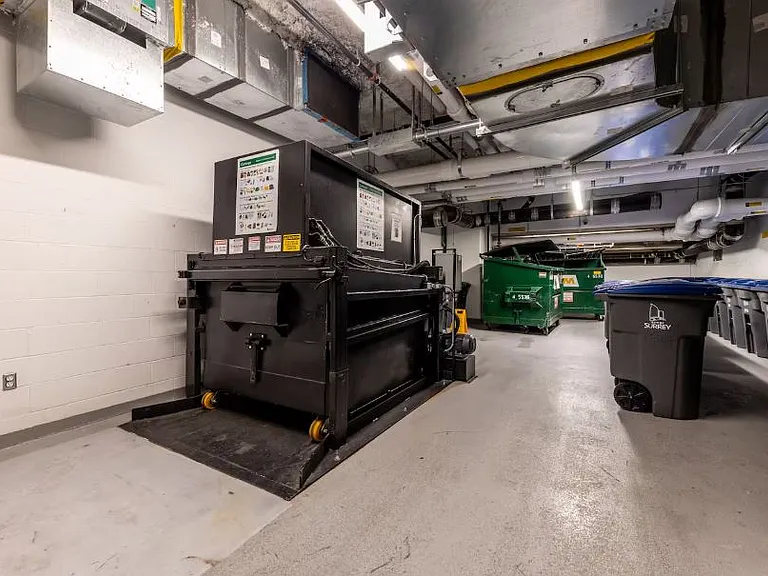 Convenient trash and compact room for easy disposal.