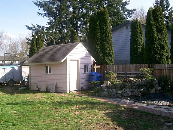 Shy 1/4 acre backyard with pond. 