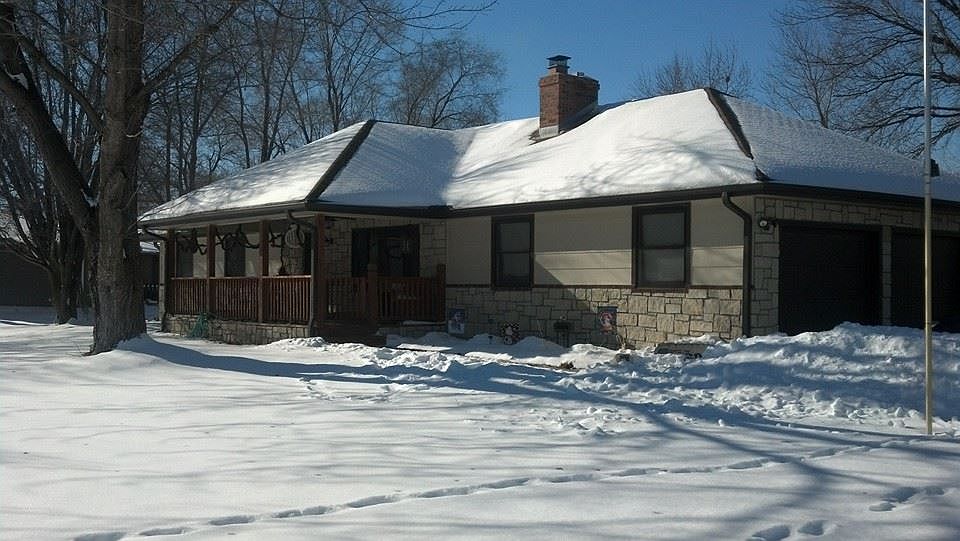 Large front porch with fan