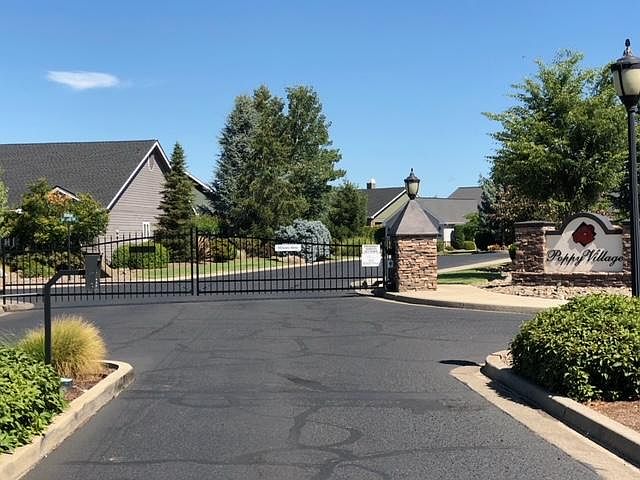 Welcome to Poppy Village! Key pad for guests or remote entry for residents.