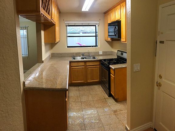 Main entrance & remodeled kitchen