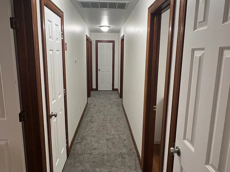 3 large closets in the hallway to the bedrooms