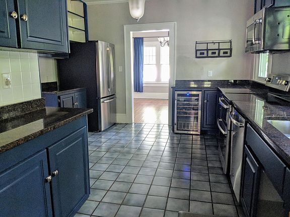 Kitchen with granite countertops and stainless steel appliances