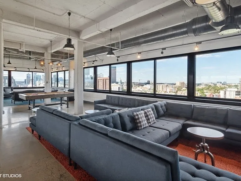 Penthouse entertainment lounge with comfortable seating at Archer Tower in Denver, CO