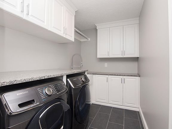 New high-end washer/dryer with plenty of mudroom storage.