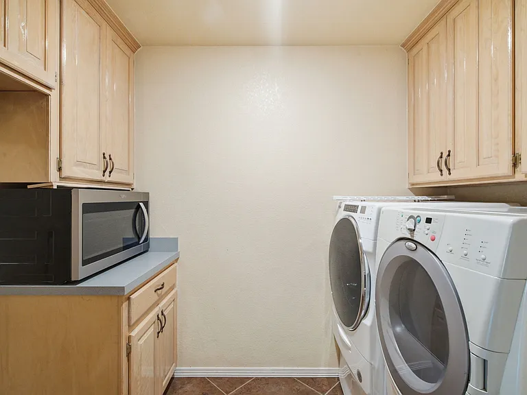 Laundry Room with Custom Cabinets