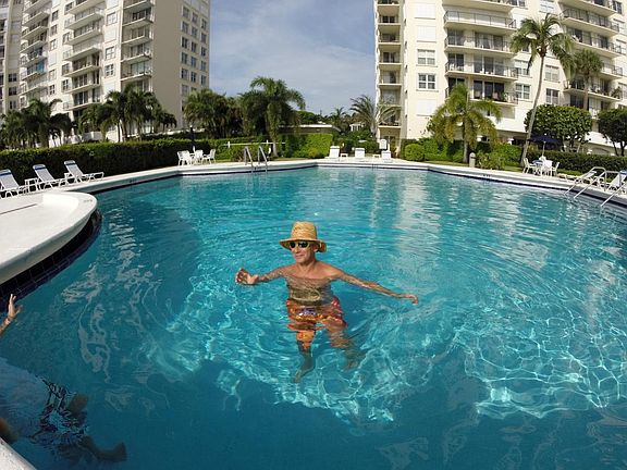 Person enjoying the pool.