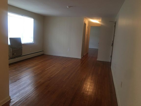 VIEW OF LIVING ROOM, FROM KITCHEN/ DINING AREA