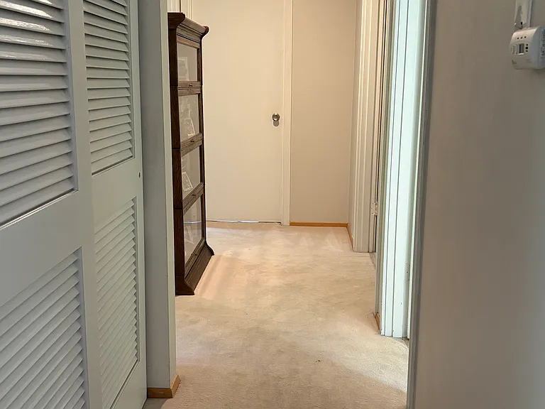 Hallway leading to 4 bedrooms