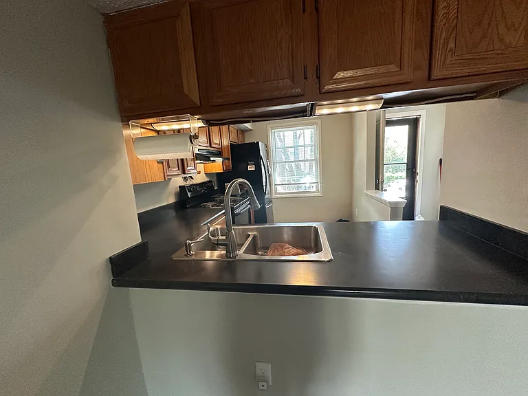 Kitchen pass through seen from the living room