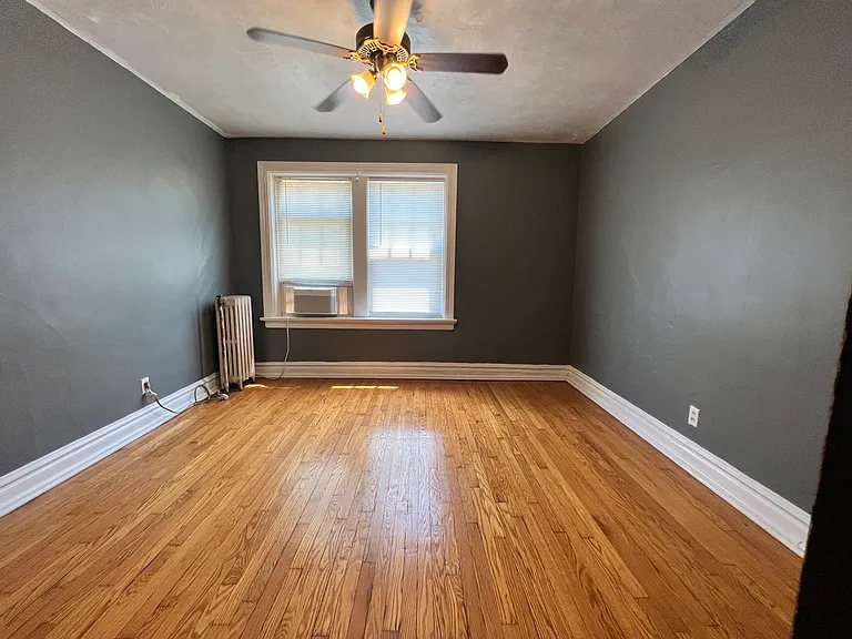 The bedroom windows face East and will provide wonderful morning light cascading onto the beautiful wood floors.