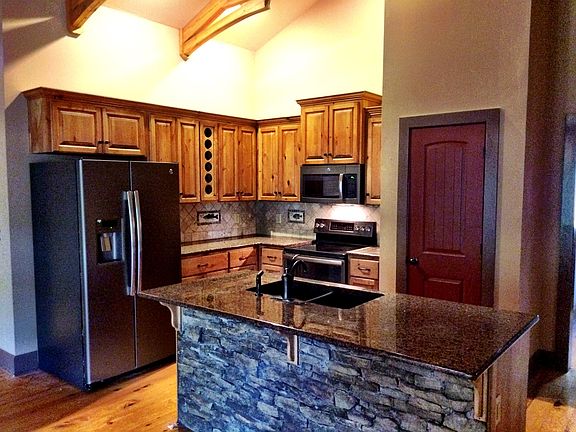 Granite Island Kitchen with new Slate Appliances