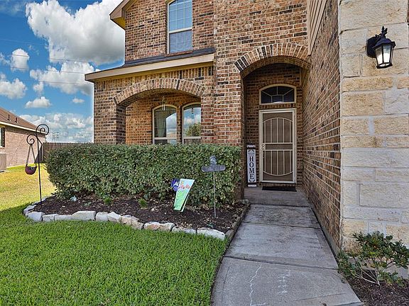 Front porch offers plenty of sitting space and privacy.