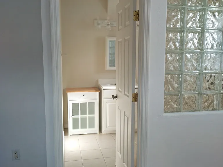 Looking into bathroom.
