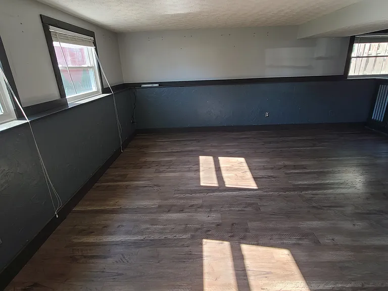 Family Room with electric fireplace and TV mount
