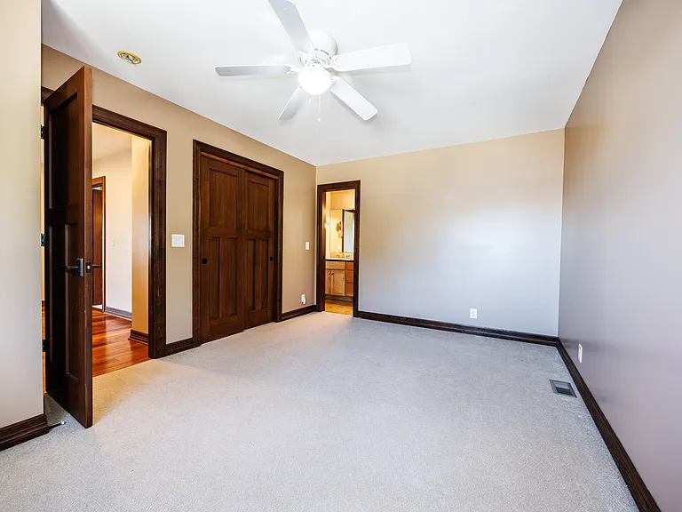 mid level Bedroom with attached shared bathroom