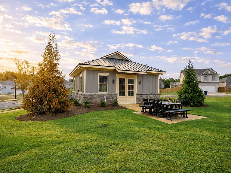 Clubhouse exterior showcasing welcoming community appeal.