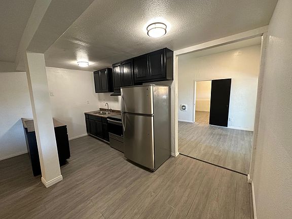 kitchen + breezeway into dining area and the bedroom hallway