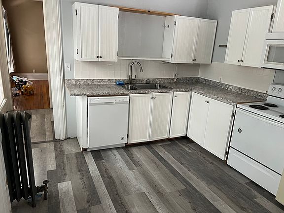 Kitchen leads into family room.