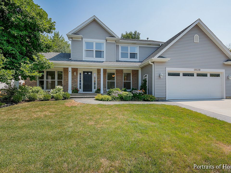 10+ Curb appeal beings with newer siding and roof (approximately 10 years old). Professionally lands