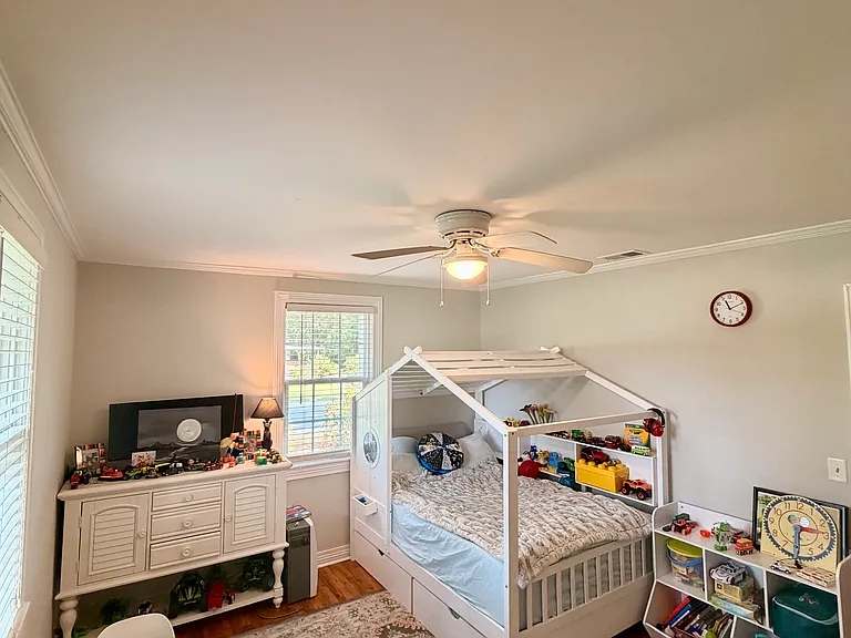 Bedroom 1, currently a children's room, has served as a great at-home office or guest bedroom in the past