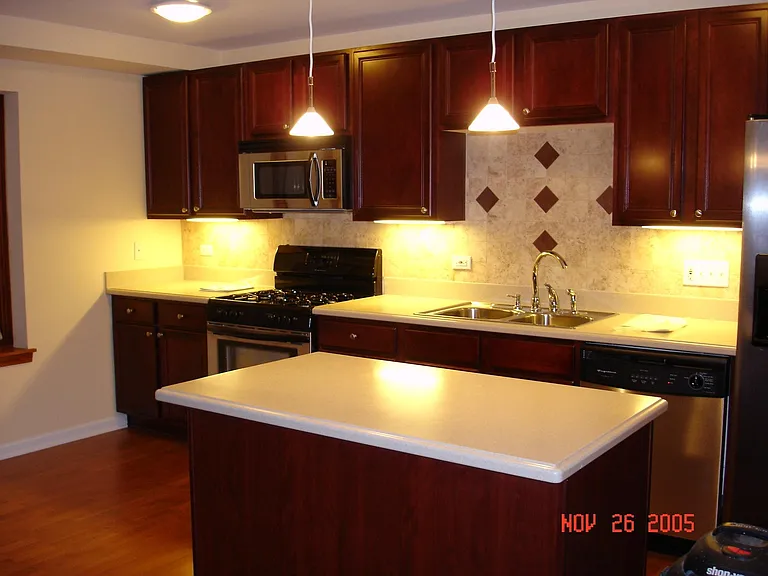 Kitchen with back splash and island