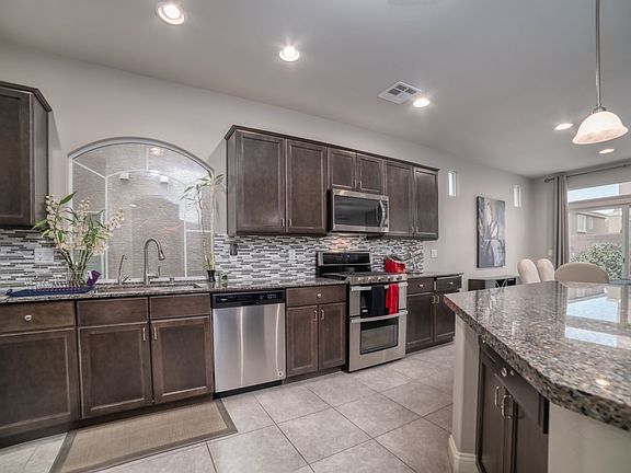 5th image of 5937 Azzura Palms Ave