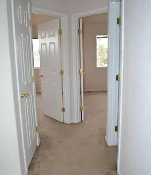 Second floor hallway as seen from the west bedroom.