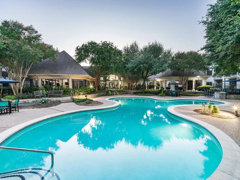 Relax or recharge by the sparkling pool, complete with shaded lounge areas and surrounded by the community's natural greenery.
