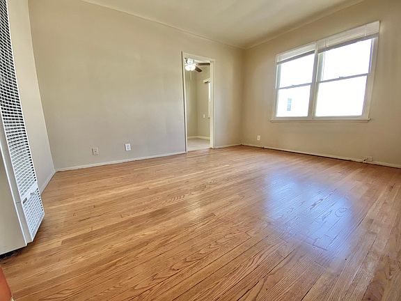 Living room view to kitchen entry