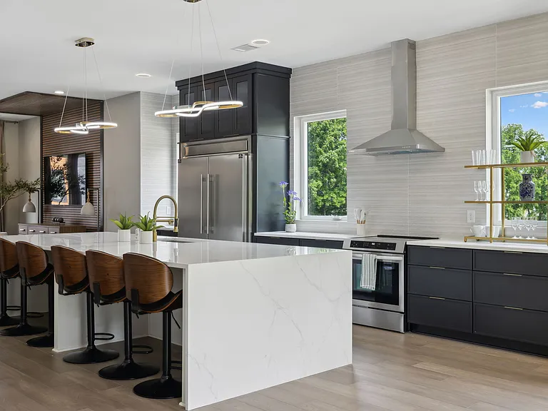Highend appliances, double fridge, induction stove.