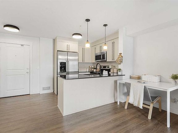 3rd image of 11 S Mahogany Row SE #3107