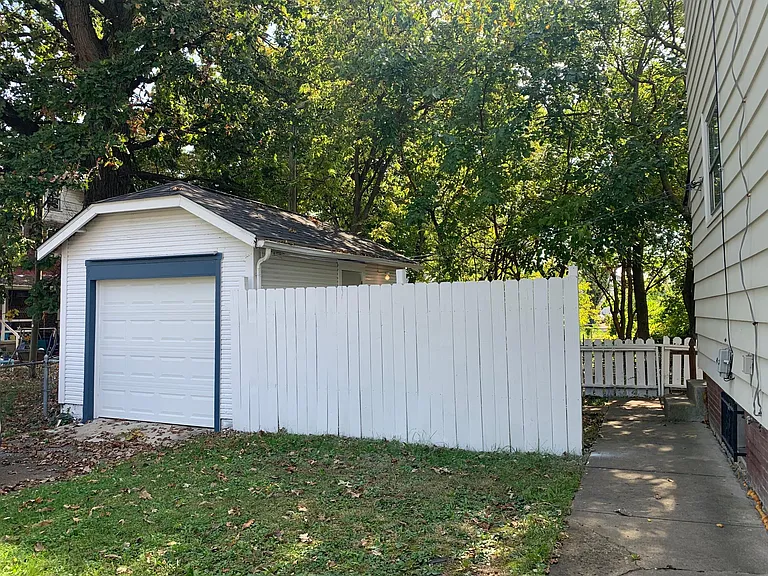 Private driveway into single car garage