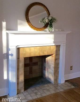 This faux fire place is the center piece of this light, airy