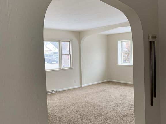 DINING ROOM LOOKING INTO LIVING ROOM