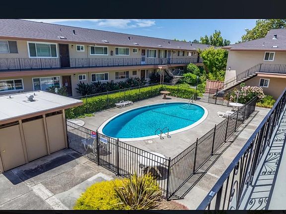 Unit overlooks the pool.