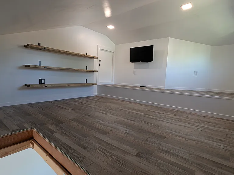 Bonus area in the attic above the garage with space to setup a small office area or a hobby area.