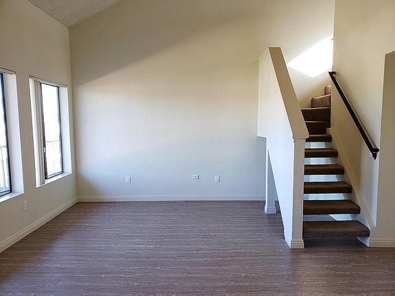 Living Room with High Ceiling