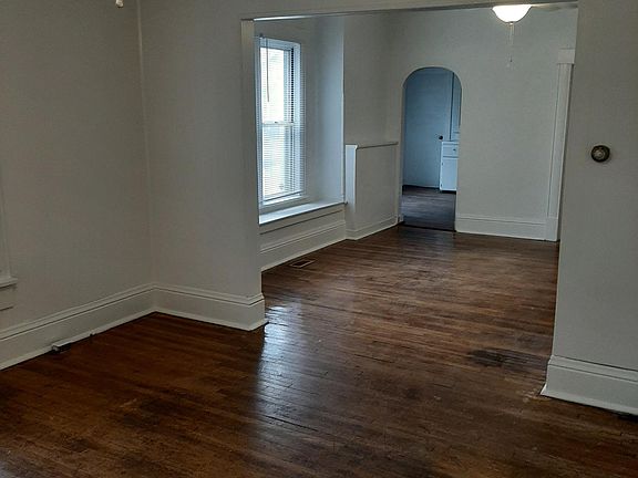 living room and dining room looking toward kitchen
