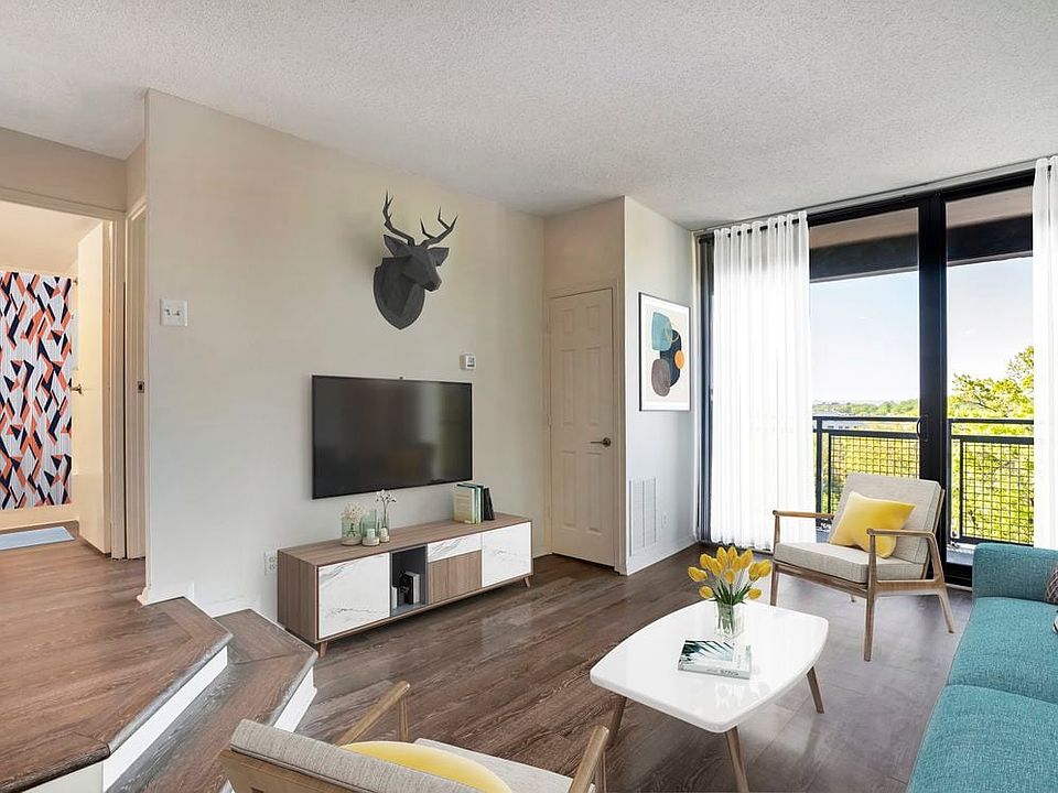 Renovated Package II living area with hard surface flooring