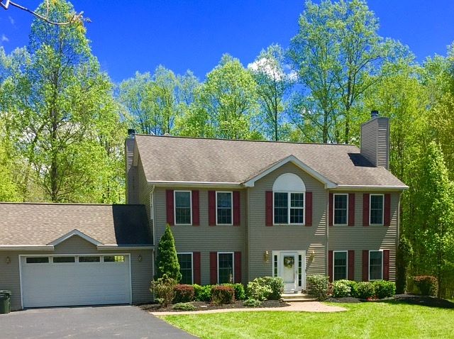 Classic Center Hall Colonial : 5 Bedrooms on over 9 serene acres.