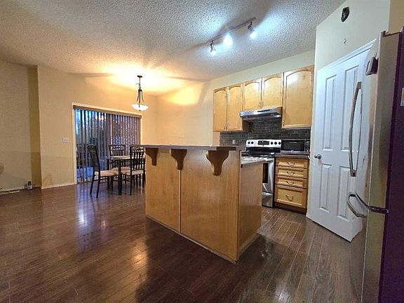 4th image of 13 E Tuscany Ridge Mews NW