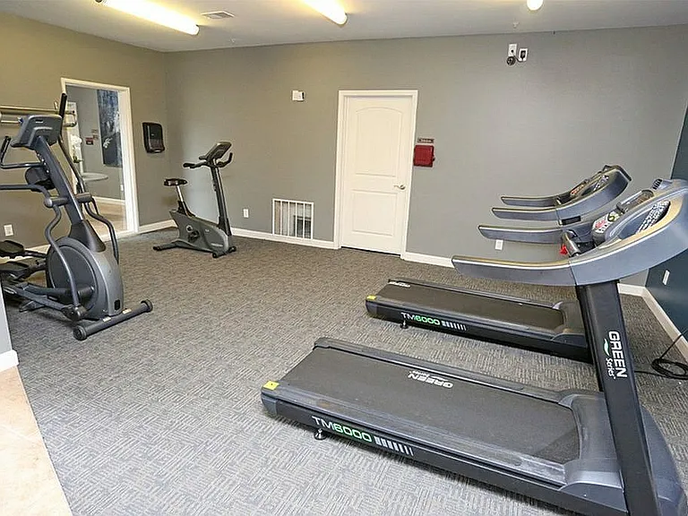 The Reserve's gym includes cardio and strength-building equipment.