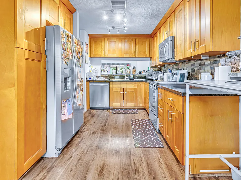 7610 Pinewalk Dr S #128 — Photo 9