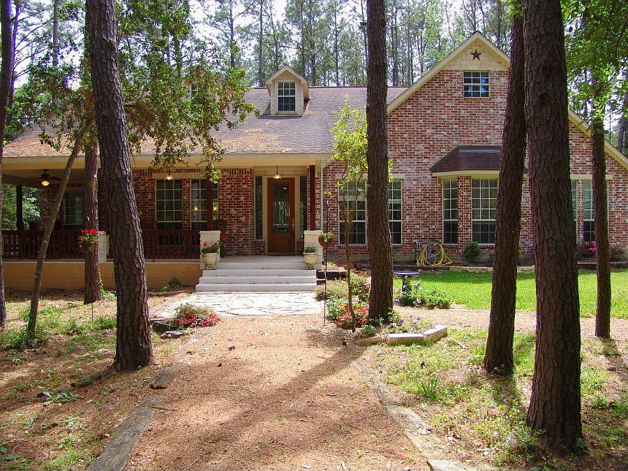 Hard to find 1.5 story on acreage in Cypress!