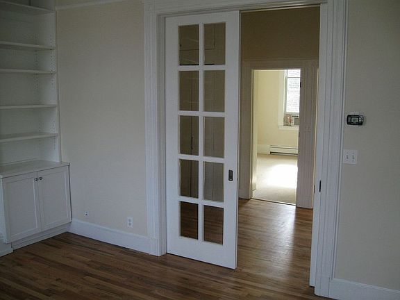 View to bedroom thru pocket french doors