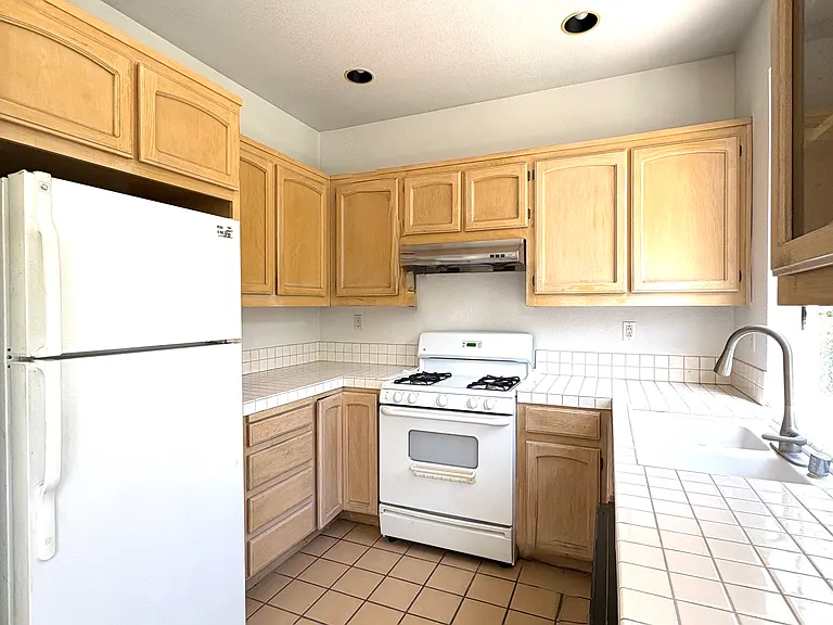 Kitchen with Gas Range & Refrigerator