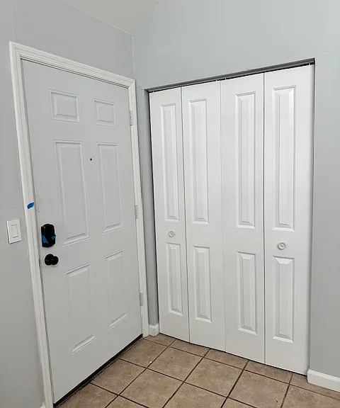 Front door and entry closet