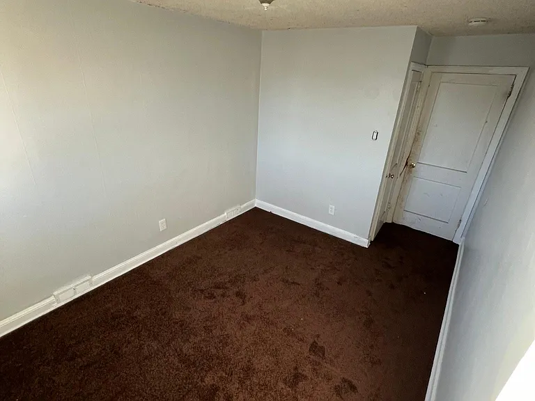 Left side secondary bedroom.