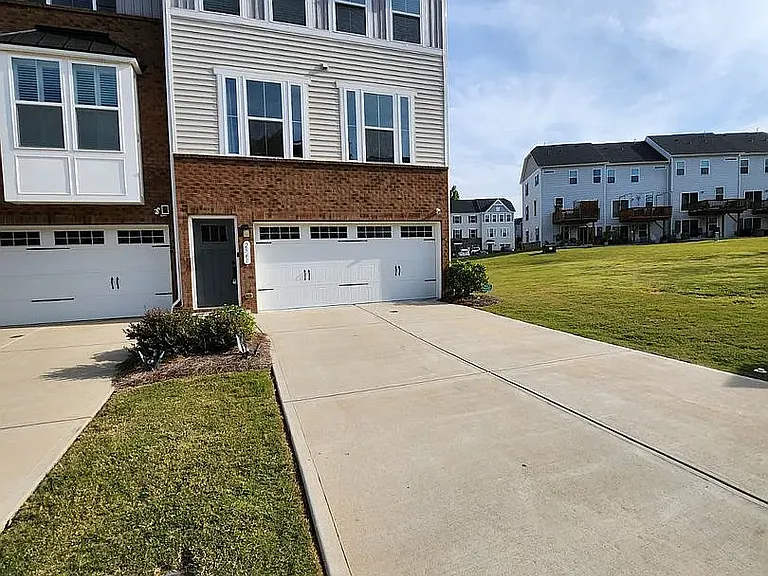 GREAT SPACE FOR 4 CARS TWO IN THE GARAGE AND TWO OUTSIDE ON THE DRIVEWAY.